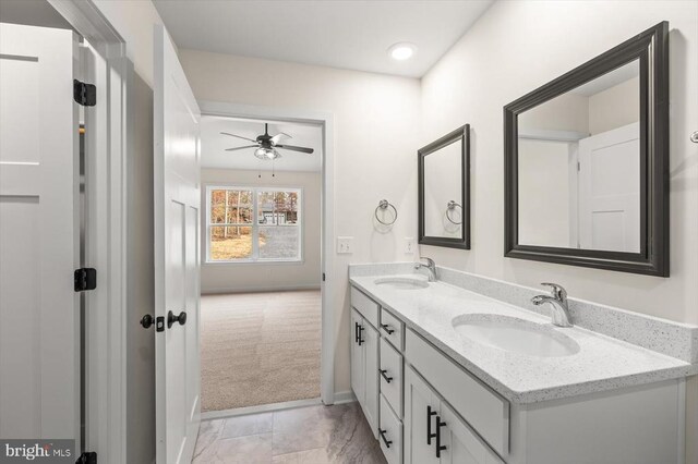 bathroom featuring vanity and ceiling fan