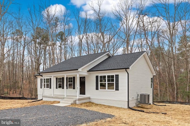 view of front of home with central AC unit and covered porch