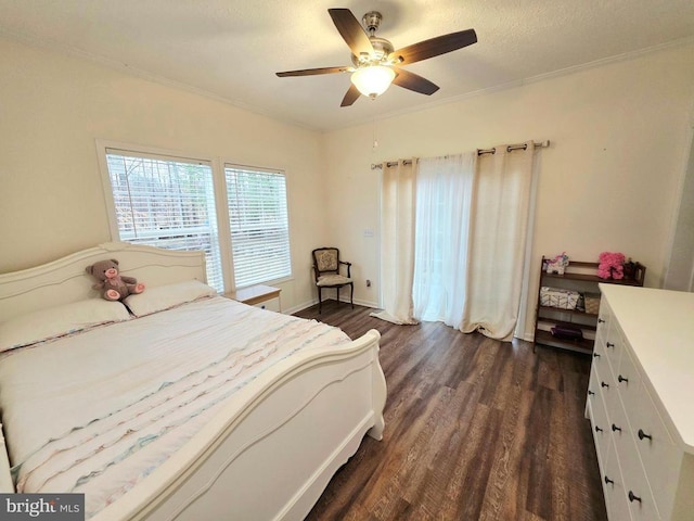 bedroom with ceiling fan, dark wood-type flooring, baseboards, and ornamental molding