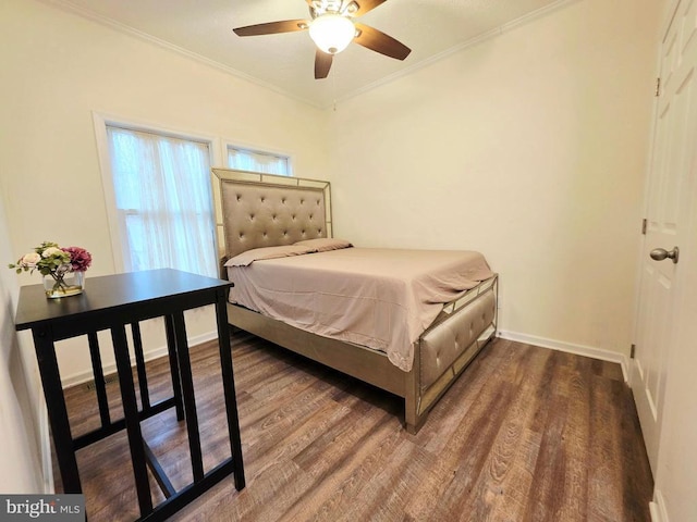 bedroom featuring ornamental molding, a ceiling fan, baseboards, and wood finished floors