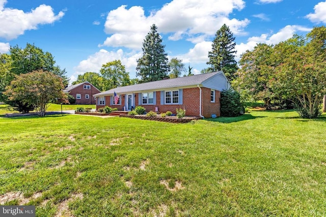 ranch-style home with a front yard