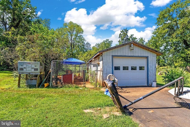 garage with a lawn