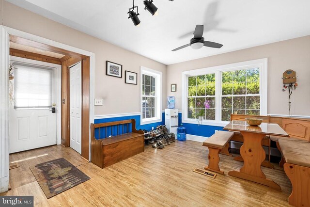 sitting room featuring ceiling fan and light hardwood / wood-style flooring