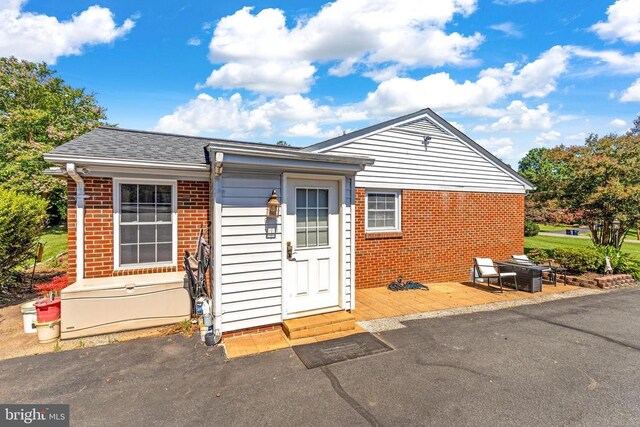 single story home featuring a patio area