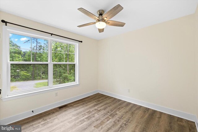 washroom with cabinets, washing machine and dryer, and light tile patterned floors