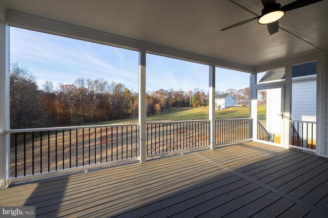 wooden deck with ceiling fan