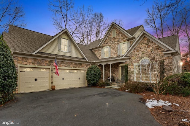 view of front of property with a garage