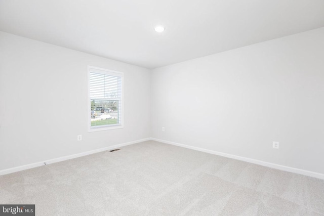 view of carpeted spare room