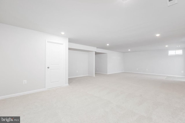 basement with light carpet