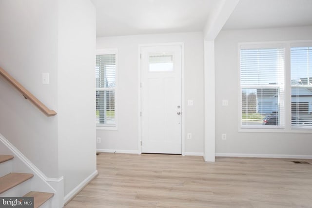 entrance foyer with light wood-type flooring