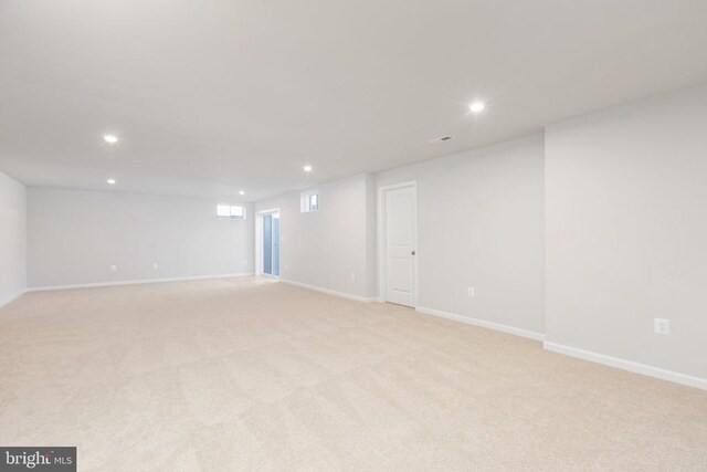 basement with light carpet