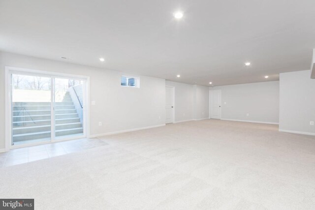 basement with light carpet