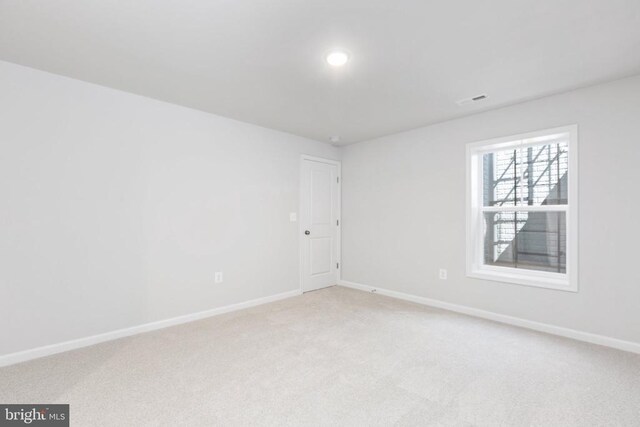 view of carpeted spare room