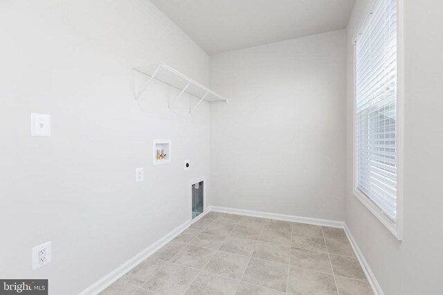 laundry room with electric dryer hookup and washer hookup