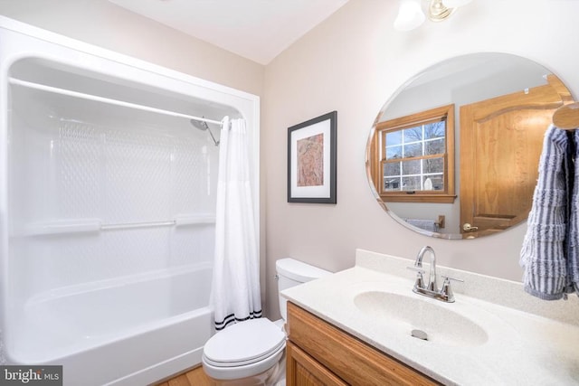 full bath featuring toilet, shower / bath combo, and vanity