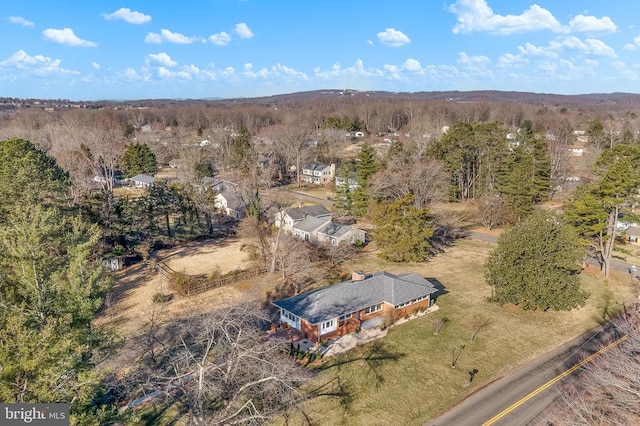 drone / aerial view with a view of trees