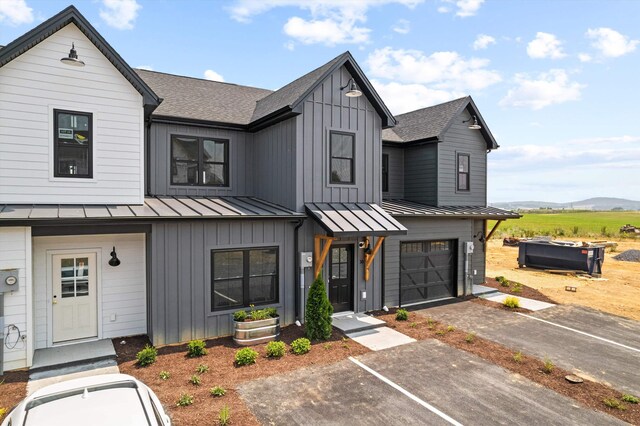 modern farmhouse style home with a garage