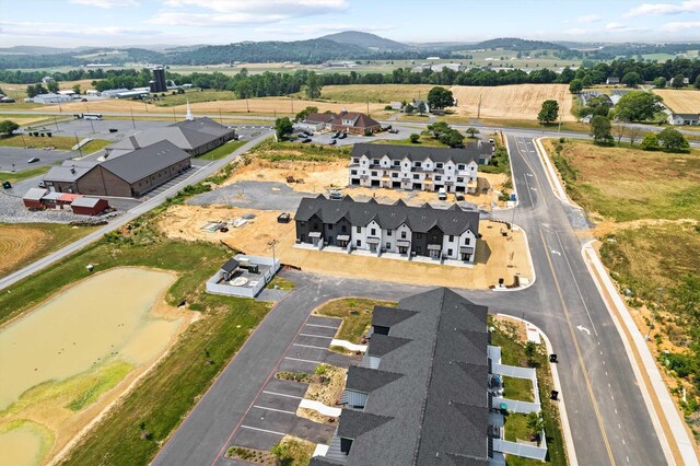 drone / aerial view featuring a mountain view