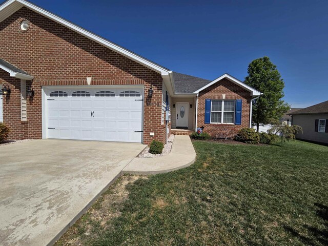 ranch-style house featuring concrete driveway, a front lawn, brick siding, and a garage