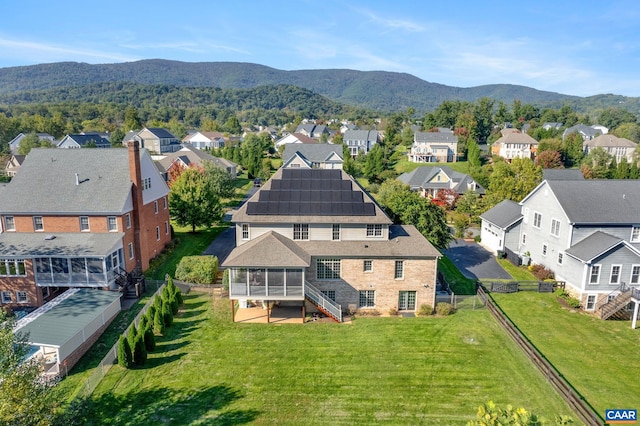 aerial view featuring a residential view and a mountain view