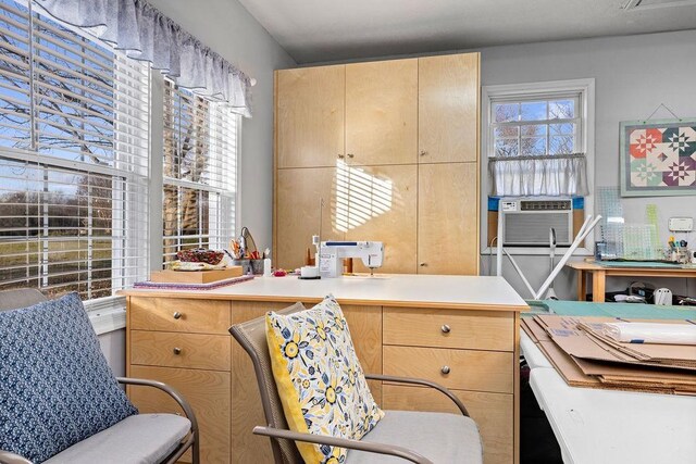 kitchen with light brown cabinetry and cooling unit