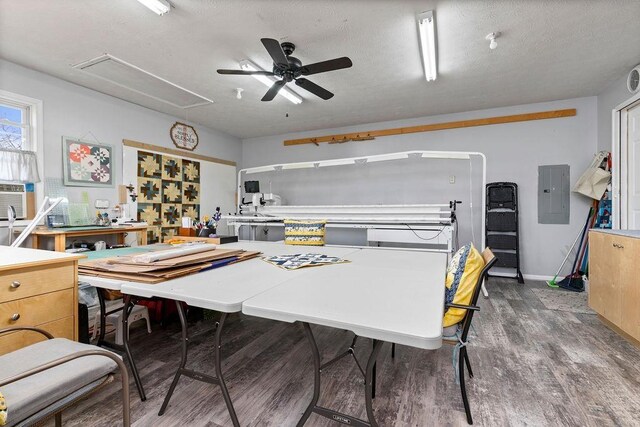 kitchen featuring dark wood-type flooring, electric panel, and ceiling fan