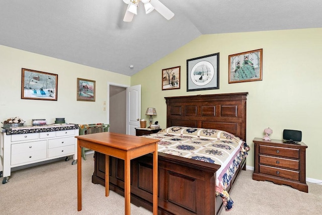 bedroom featuring ceiling fan, light colored carpet, and lofted ceiling