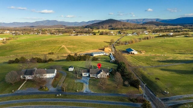 aerial view featuring a mountain view and a rural view