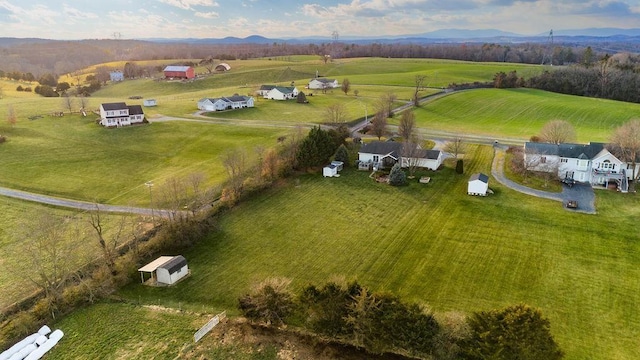 aerial view with a mountain view and a rural view