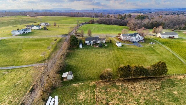 drone / aerial view with a rural view and a mountain view