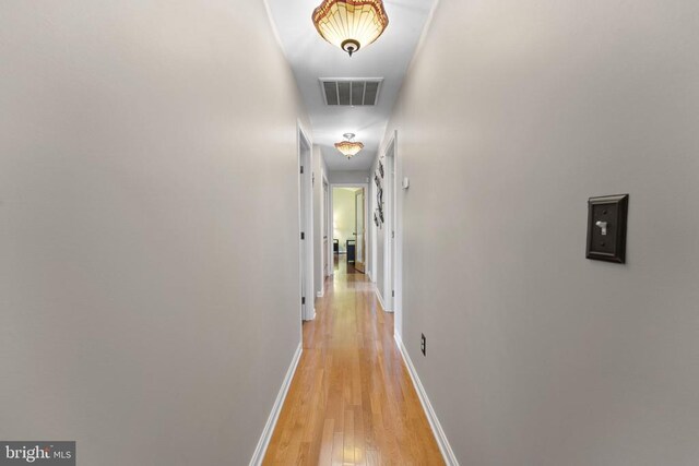 hallway featuring light wood-type flooring