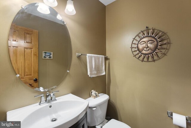 bathroom featuring sink and toilet