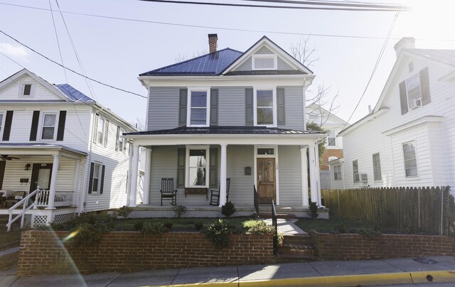 view of property featuring a porch