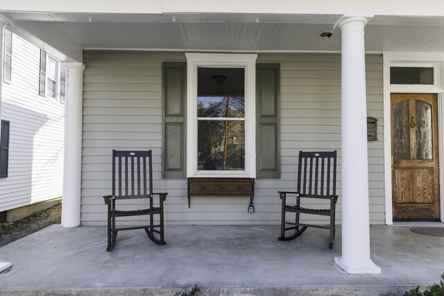 view of patio featuring a porch