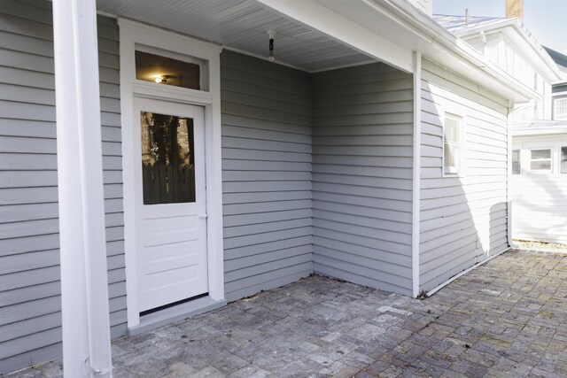 entrance to property with a patio area