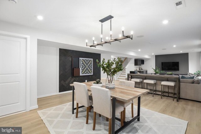 dining room featuring light hardwood / wood-style floors