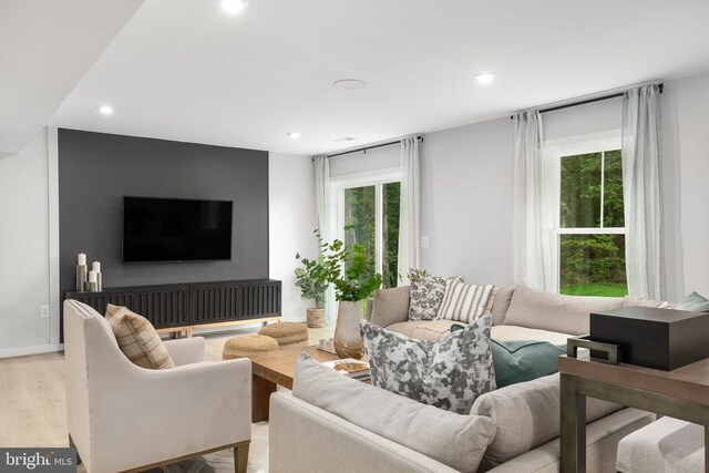 living room with light hardwood / wood-style floors