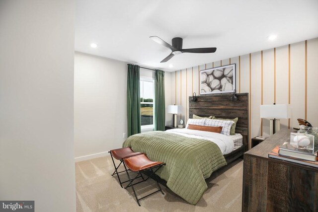 carpeted bedroom featuring ceiling fan