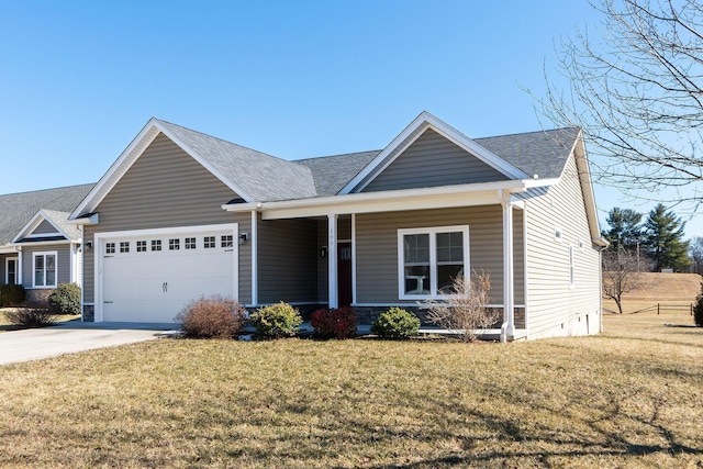 view of front of house with a front yard, a garage, driveway, and a shingled roof