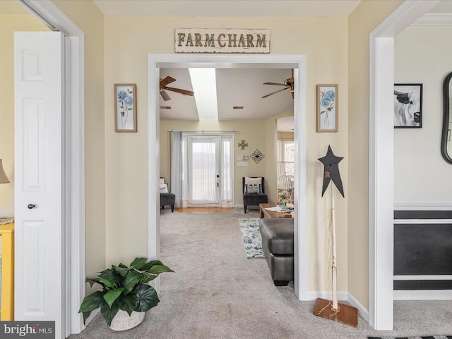 hallway featuring carpet