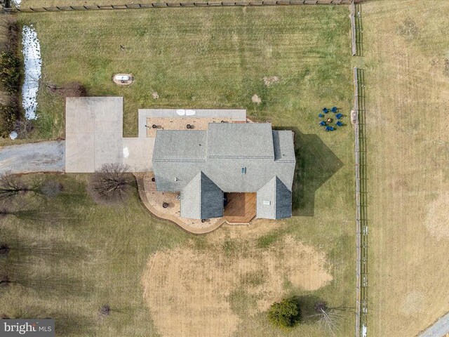 birds eye view of property featuring a rural view