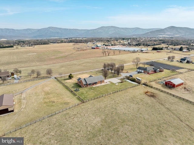 bird's eye view featuring a rural view and a mountain view