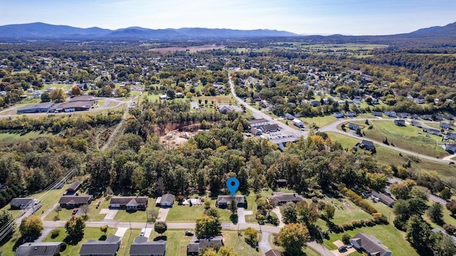 drone / aerial view featuring a mountain view