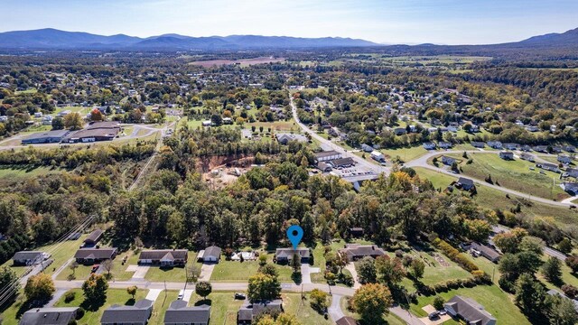 drone / aerial view featuring a mountain view