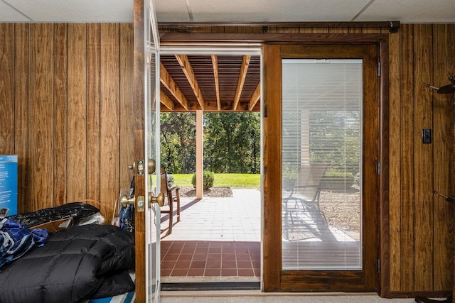 doorway with wooden walls