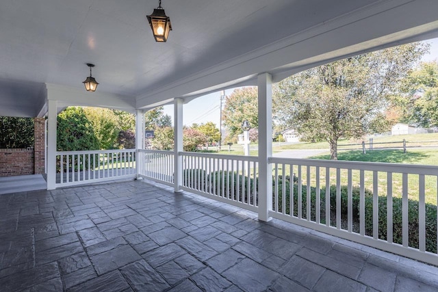 view of patio featuring a porch