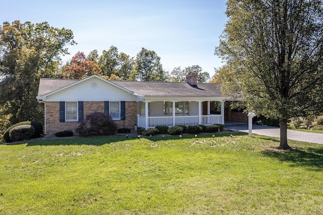 single story home with a porch and a front yard