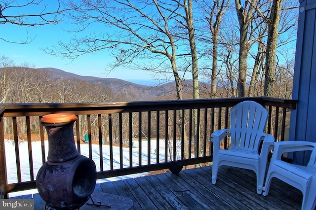 deck with a mountain view