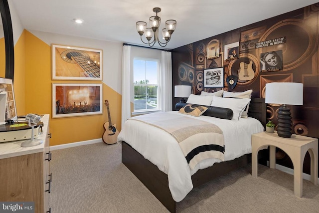 carpeted bedroom featuring an inviting chandelier