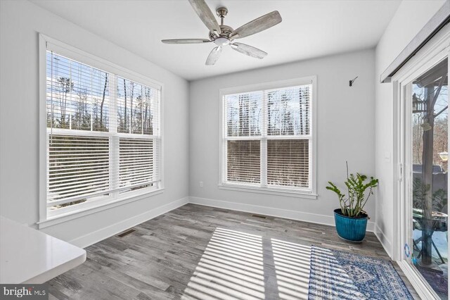 interior space featuring ceiling fan